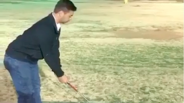 Golf fans REACT as a golfer WHACKS a pile of balls at the driving range!